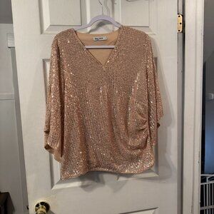 Grace Karin bell sleeve blush colored sequin top with arm cutouts.  Size XL.